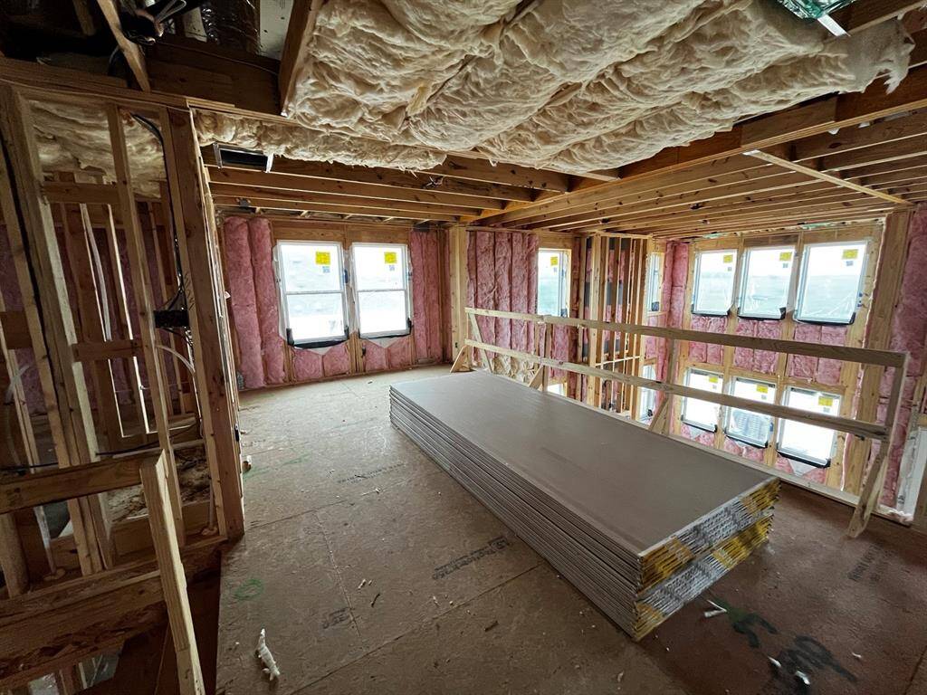 Versatile loft overlooking great room - still under construction!