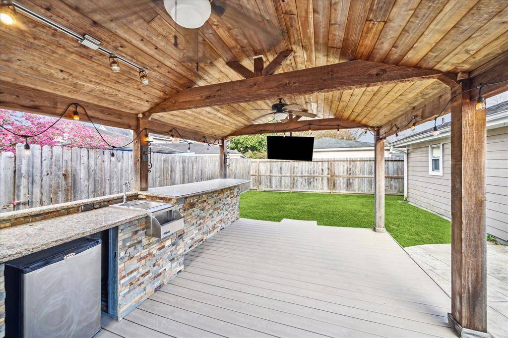 Back yard even has green space for pets or children...
