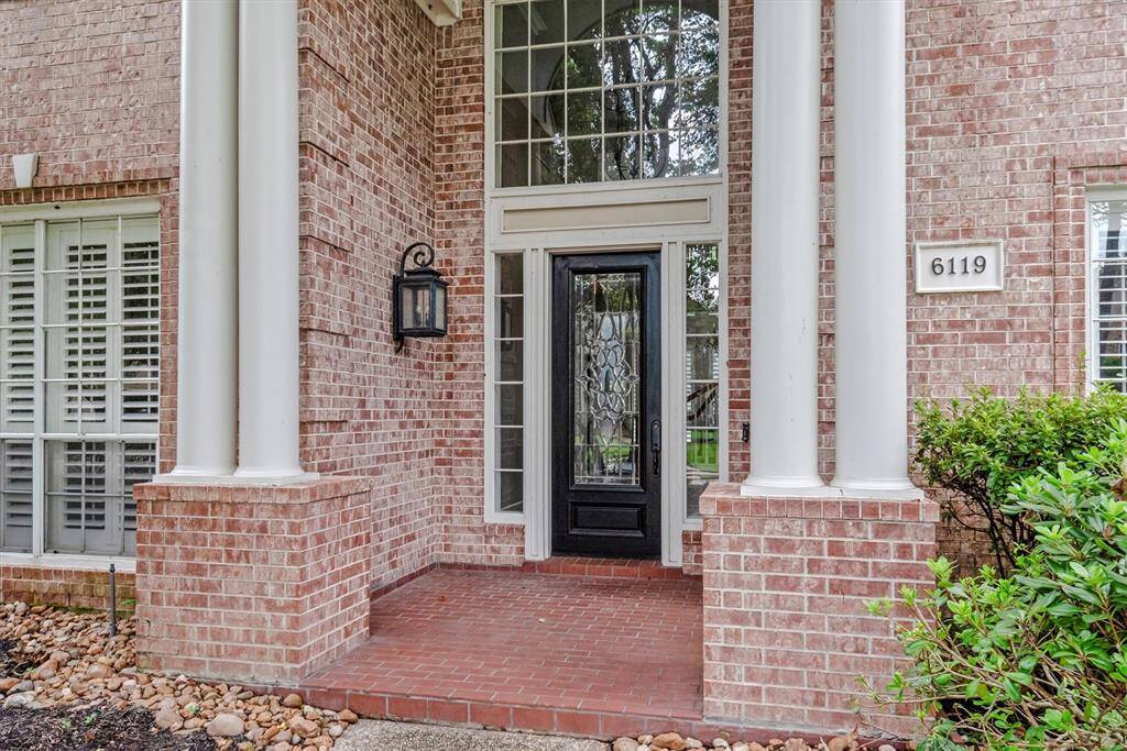 Stately front covered front porch.