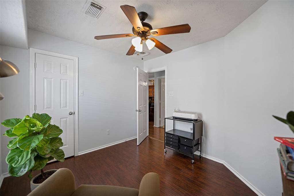 The second bedroom offers a bright and versatile space for your second office.