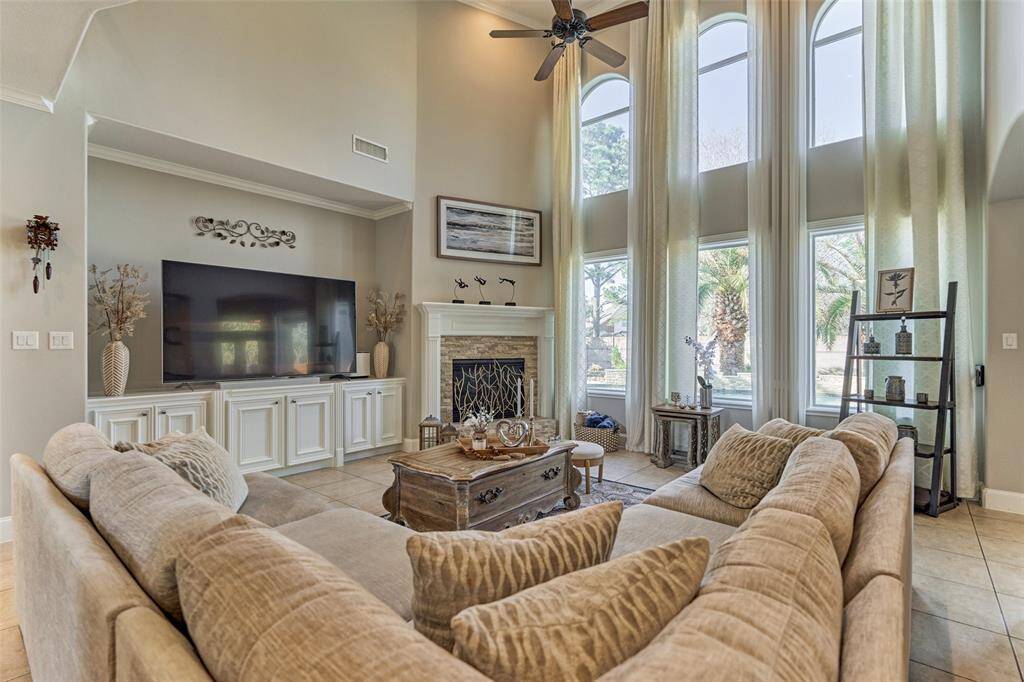 Spacious living room with a built-in TV area and cozy relaxation space.