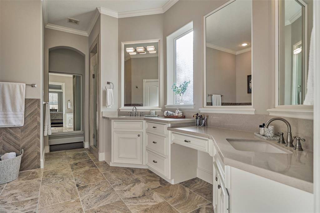 Luxurious and bright en-suite bathroom, perfect for relaxation and rejuvenation.