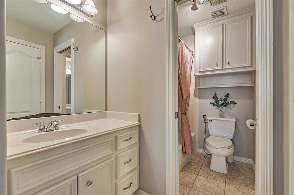 Spacious second full bath conveniently located upstairs.