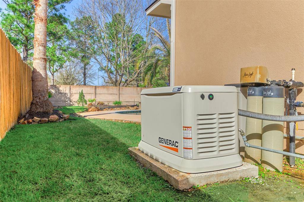 This home features a reliable backup generator and a comprehensive water filtration system for uninterrupted power and clean water.
