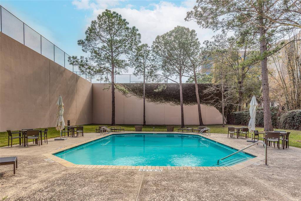 A view of the large stunning swimming pool available only to residents of the building. Very private yet in a wonderfully large outdoor area.