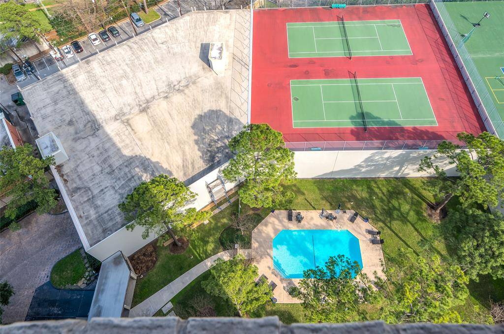 The building is beautifully maintained with manicured grounds, 24-hour concierge, outdoor pool, two deeded parking spaces on the ground level of the parking garage, access to a beautifully appointed community room with comlete kitchen for resident gatherings or events, and on-site tennis courts.