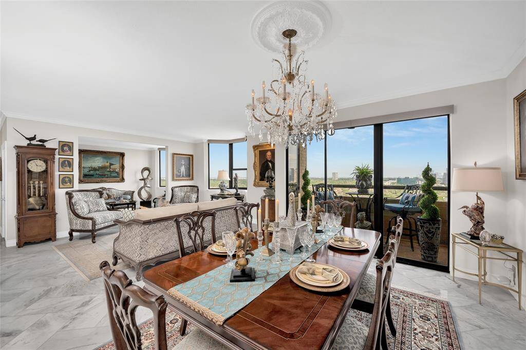 Spacious open concept Dining Room, Living Room, and Den offer versatile furniture configurations and entertainment options.