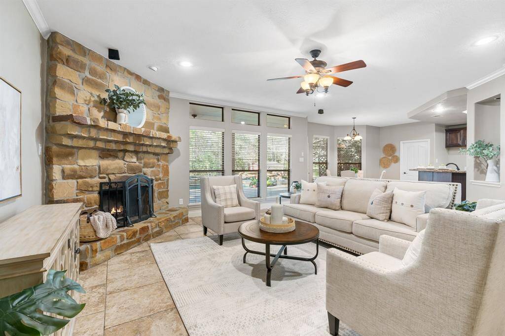 Family room has a great deal of natural light. You have a gorgeous view of the backyard..