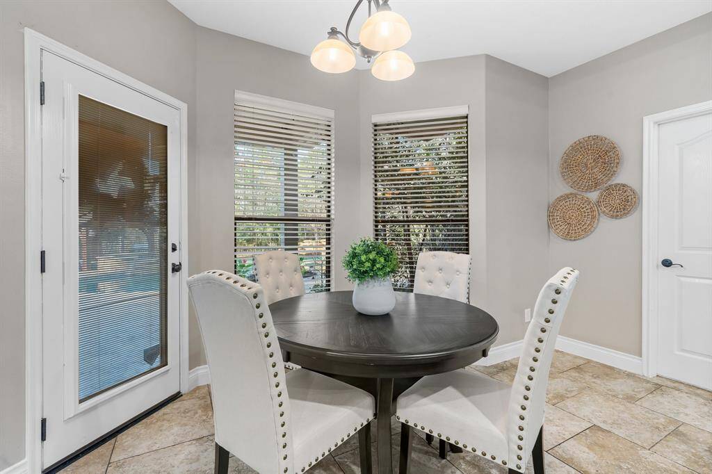 Cozy breakfast room.  Door leads to the covered porch.