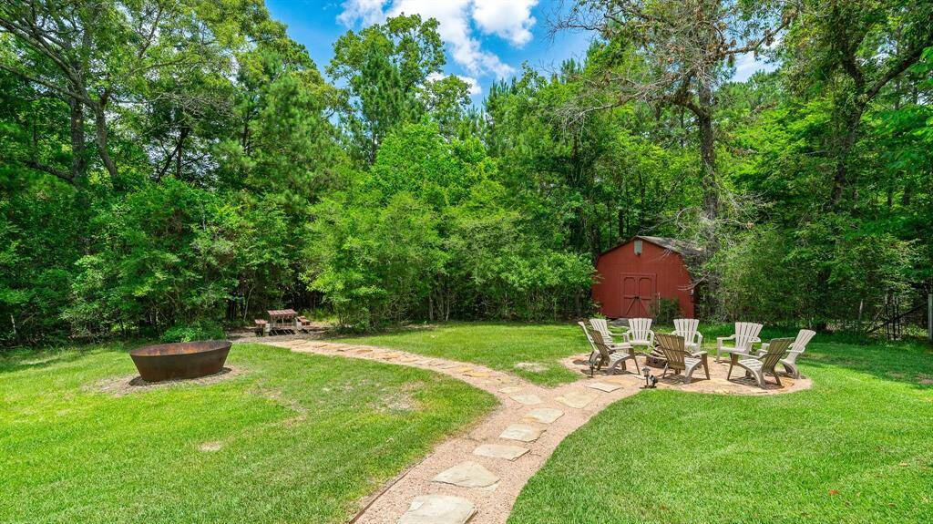 The picturesque lofted barn provides a great deal of storage space.  Pool, lawn, and other miscellaneous things.  There's room for all of it!