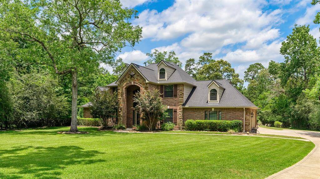 This stately home is perfectly situated on a cul-de-sac lot. Additional driveway has been added for additional parking for guests, RV, or trailer.