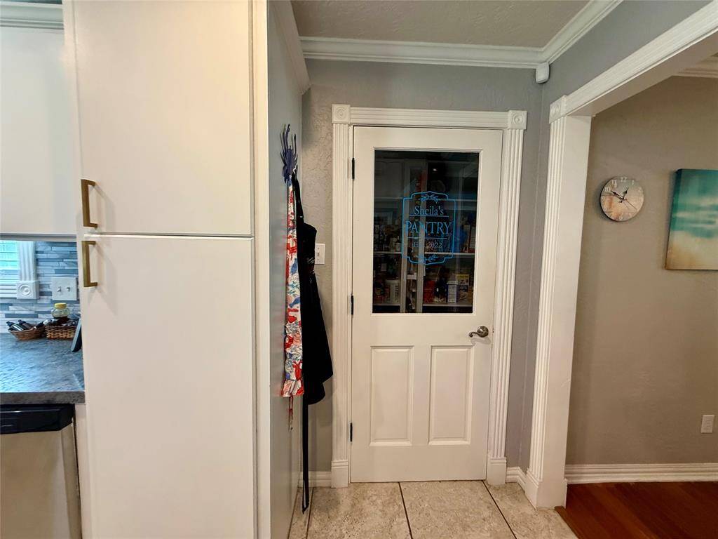 Large pantry with a light up wine rack