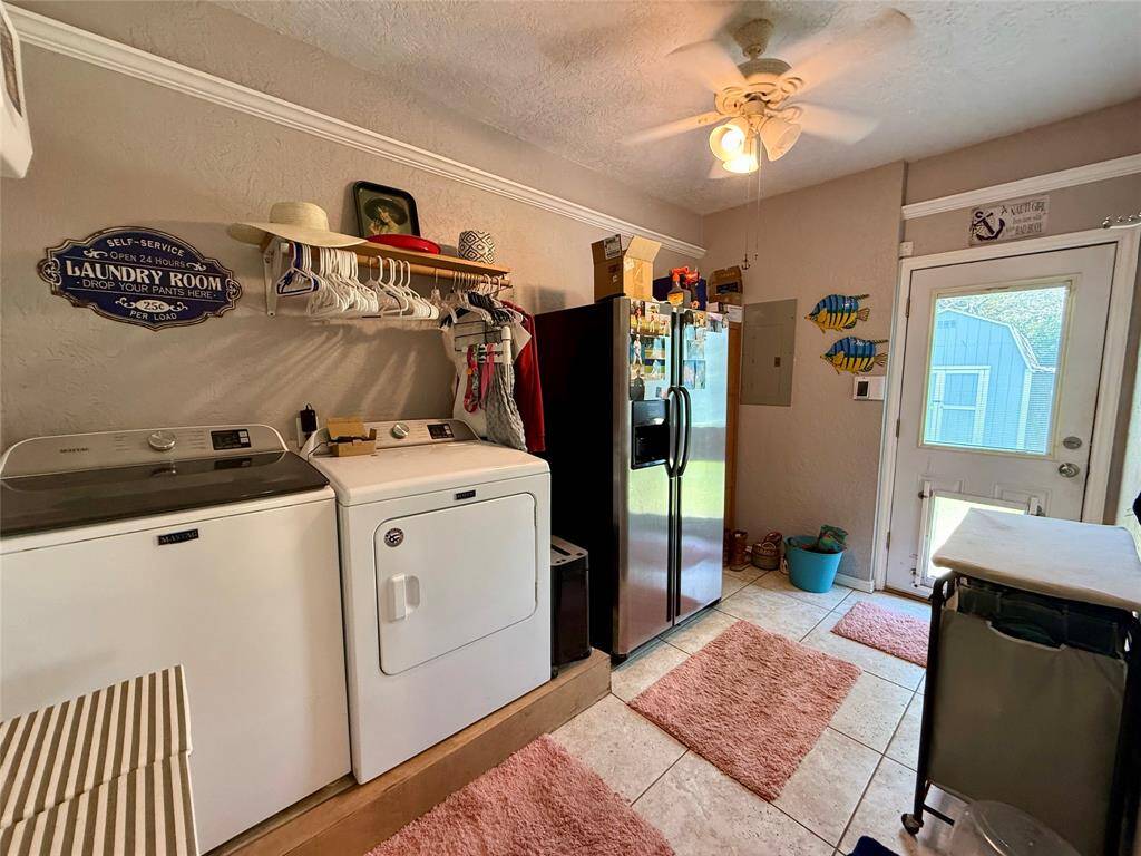 Utility room just off the kitchen - leads to backyard