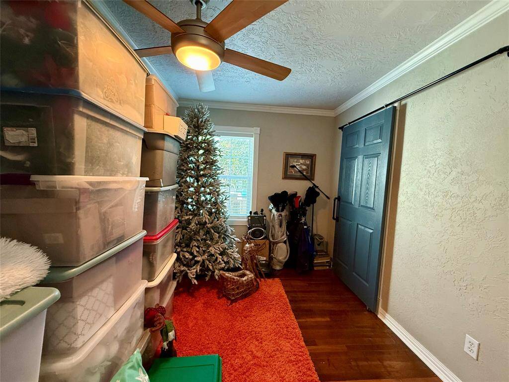 Closet has a sliding barn door