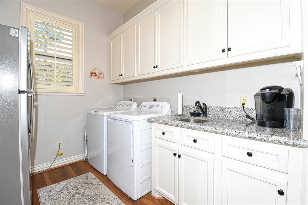 Laundry Room with space for a second fridge