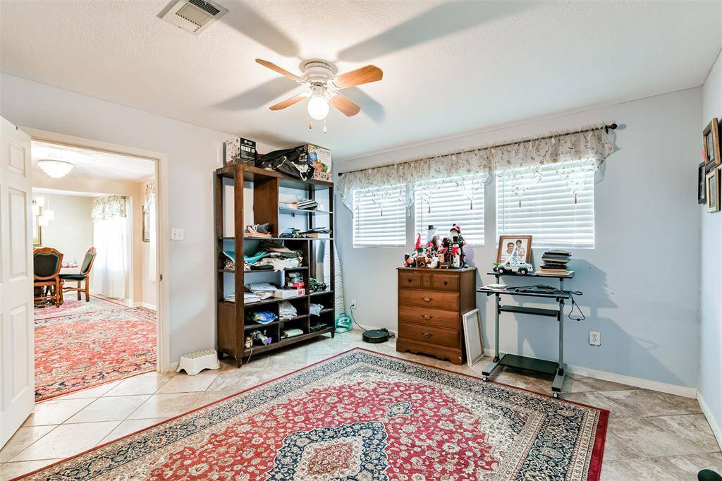 Another view of bedroom off of front door.