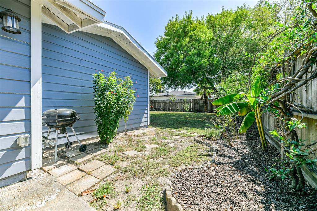 Side yard leading to backyard.