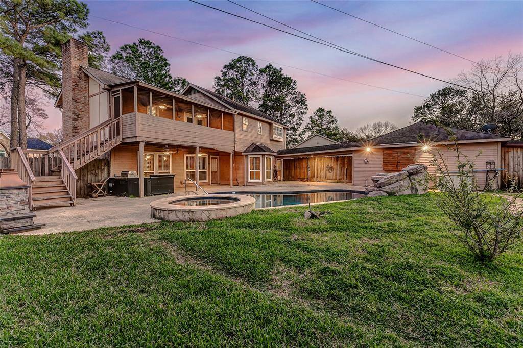 Backyard made for entertaining ( outdoor tv, heated pool and waterfall, gazebo, outdoor kitchen and 2 patios)