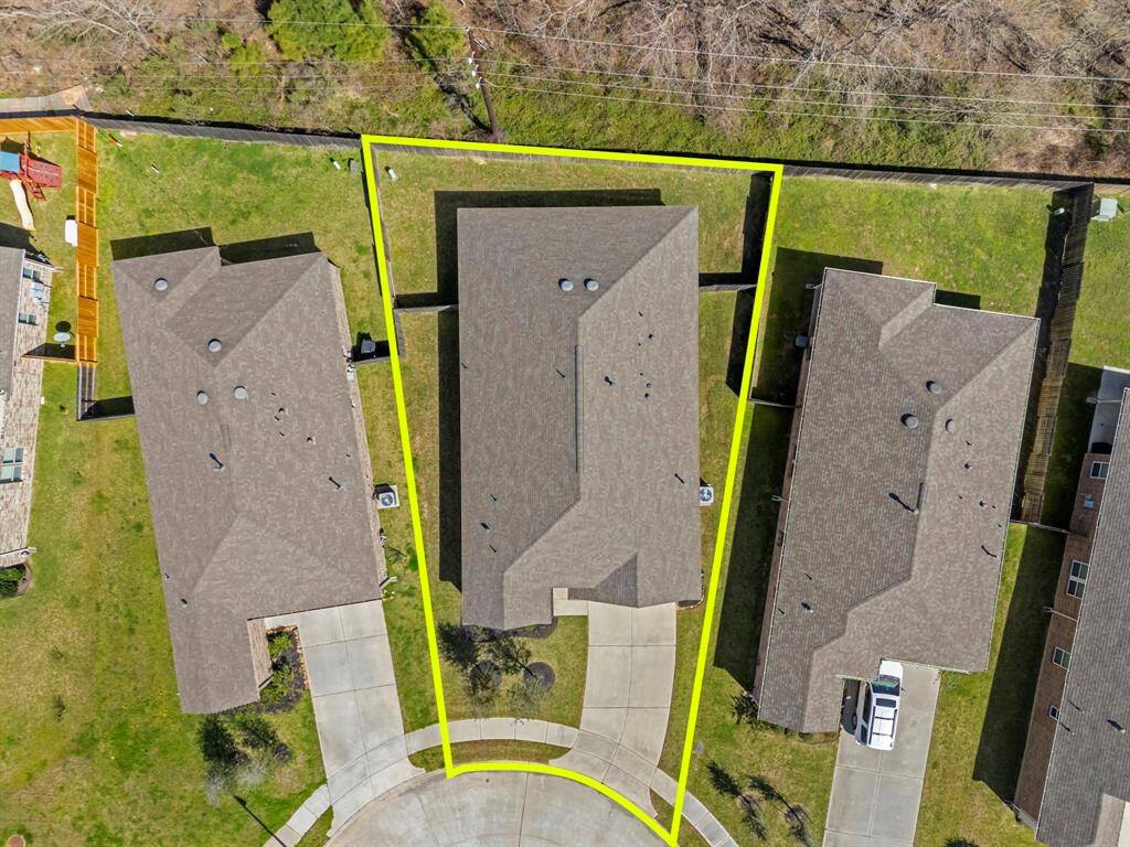 An aerial view of the home with a view of the greenbelt - NO backyard neighbors!