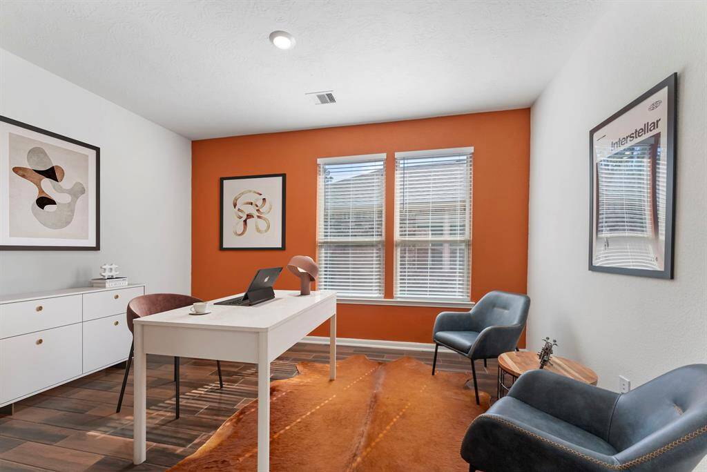 Just off the entry, you will find a nice sized office than could easily be used as playroom or bonus room! *this image has been virtually staged