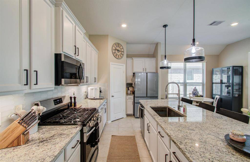 Another view of the kitchen & island
