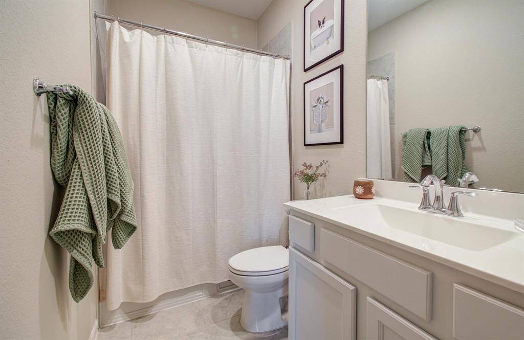 Secondary bathroom in the front of the home