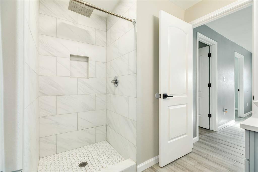 The third bath with a shower..  This home is perfect for 3 UTMB or college students, each having their own bedroom and bath, as well as an extra place for studing.