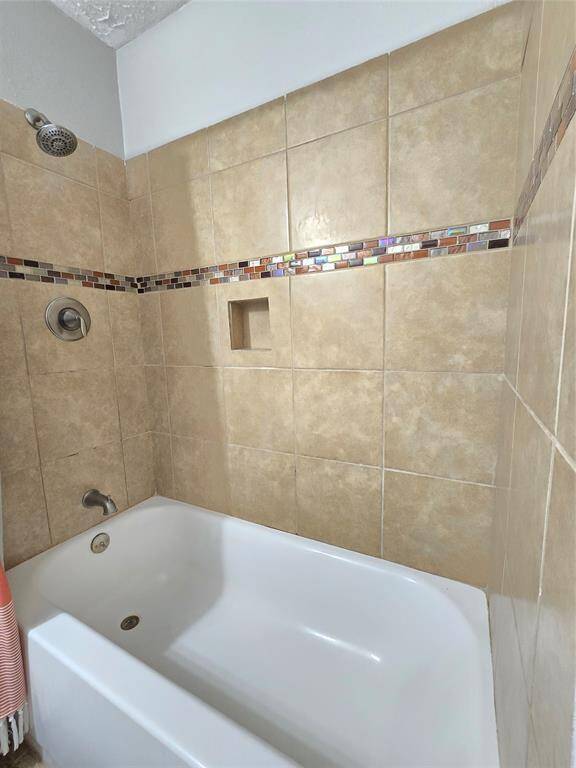 Experience versatile comfort with the tub/shower combo in the Second Bathroom.
