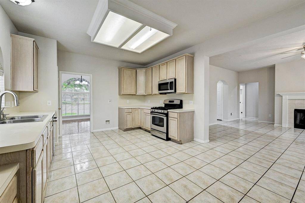 Kitchen opens to the living area.