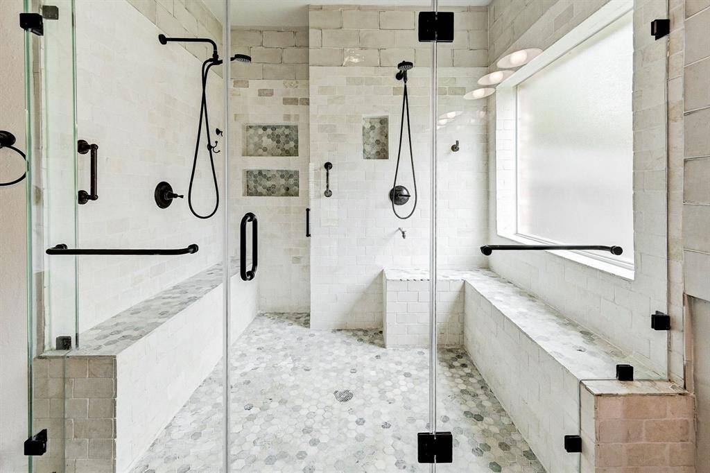 Primary shower updated with dual shower room.