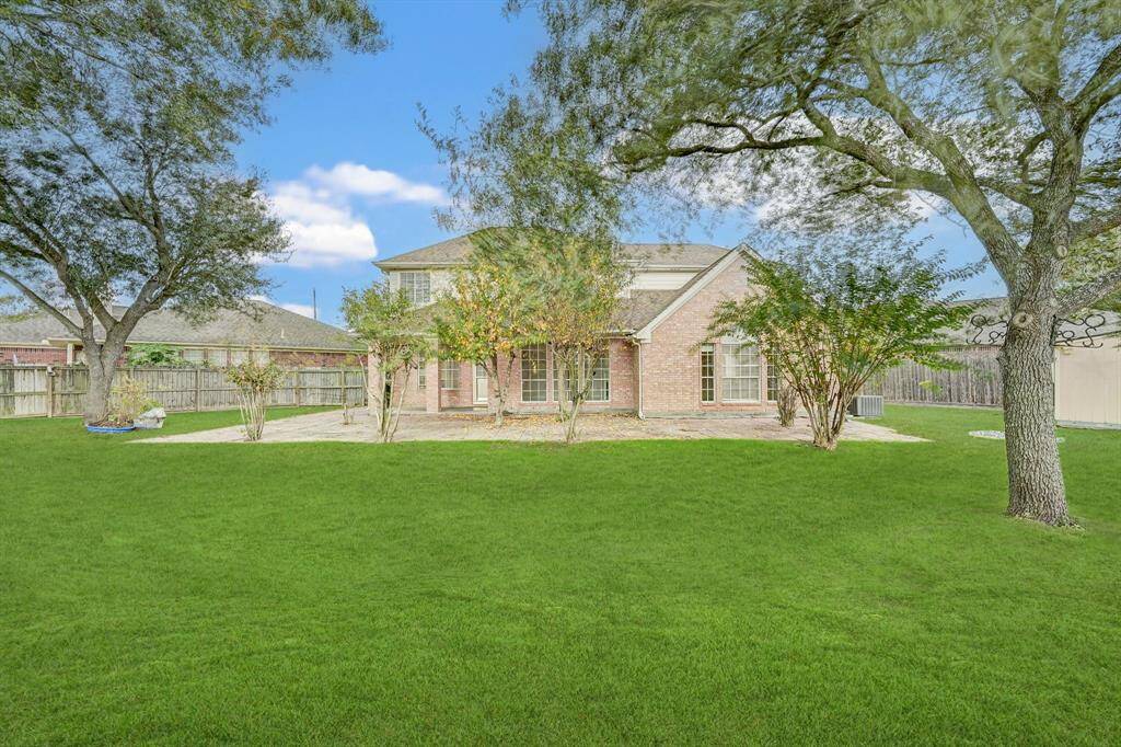 Oversized backyard with loads of room to play with.
