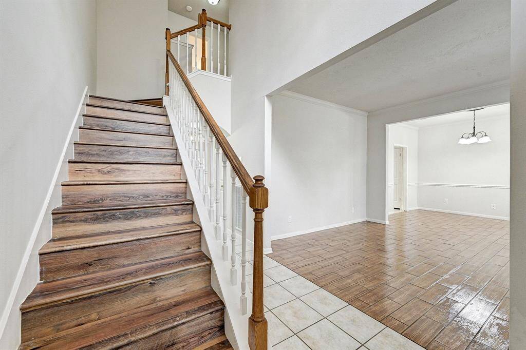 Updated flooring on the stairs and second story.