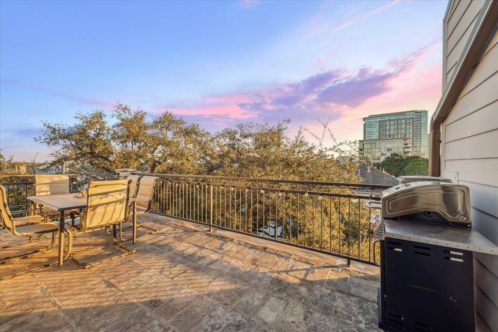 Rooftop Terrace II- This Terrace faces South and offers treetop views of the evening sunset.