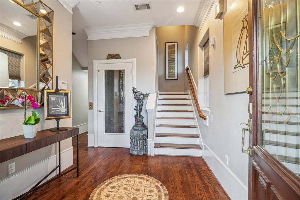 Front entrance features double doors with view of elevator to all floors
