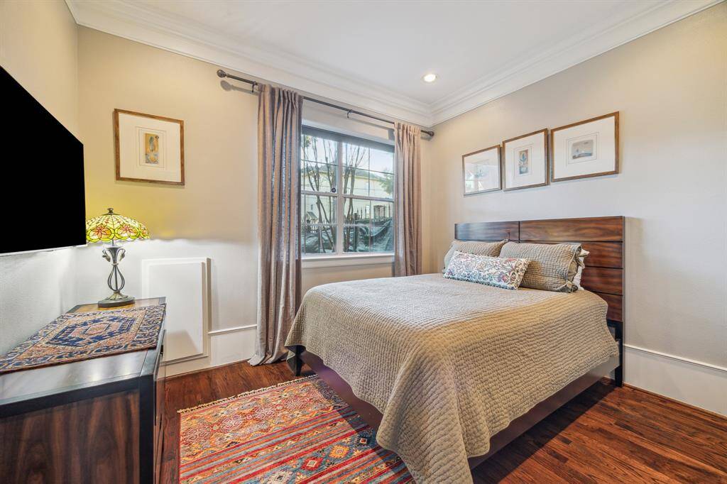 Downstairs Secondary Bedroom-Spacious Secondary with wood floors