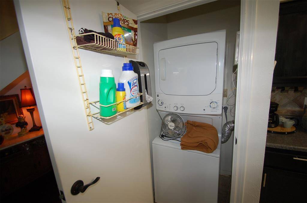 Stackable washer & dryer stay & are downstairs.