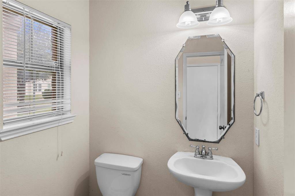Half bathroom located downstairs.