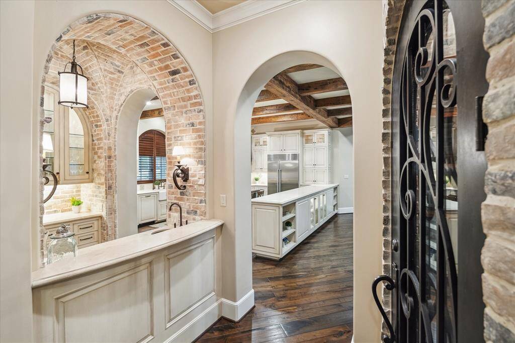 Views of the fully customized bar which can double as a coffee bar; wine cellar and butler serving bar.