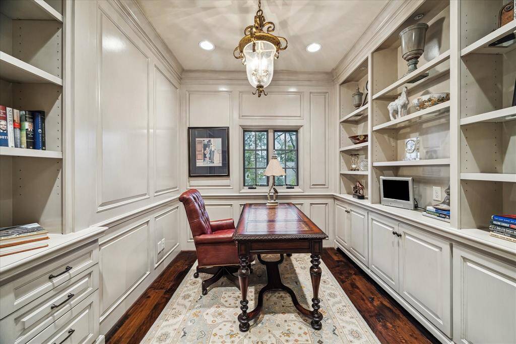 Second office on the second floor whas custom built-ins and wall paneling.
