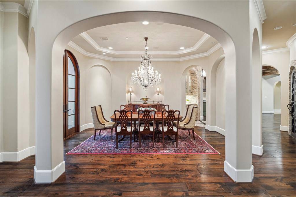 Another view of the formal dining room with a hallway to access to the kitchen.