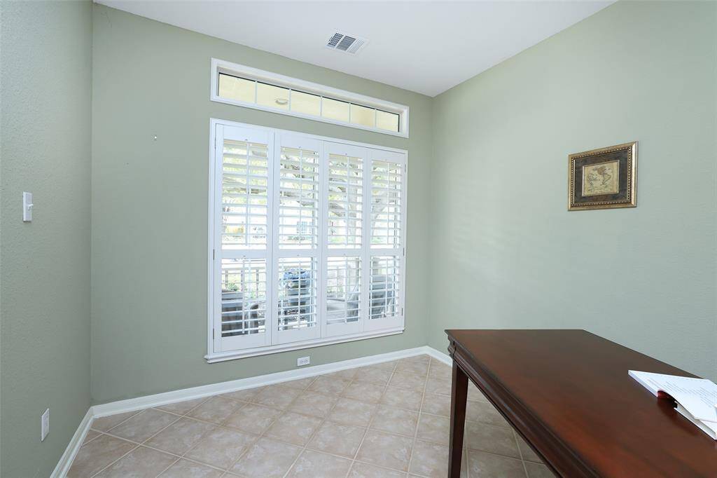 Tiled floors and plantation shutters adds that custom feel.