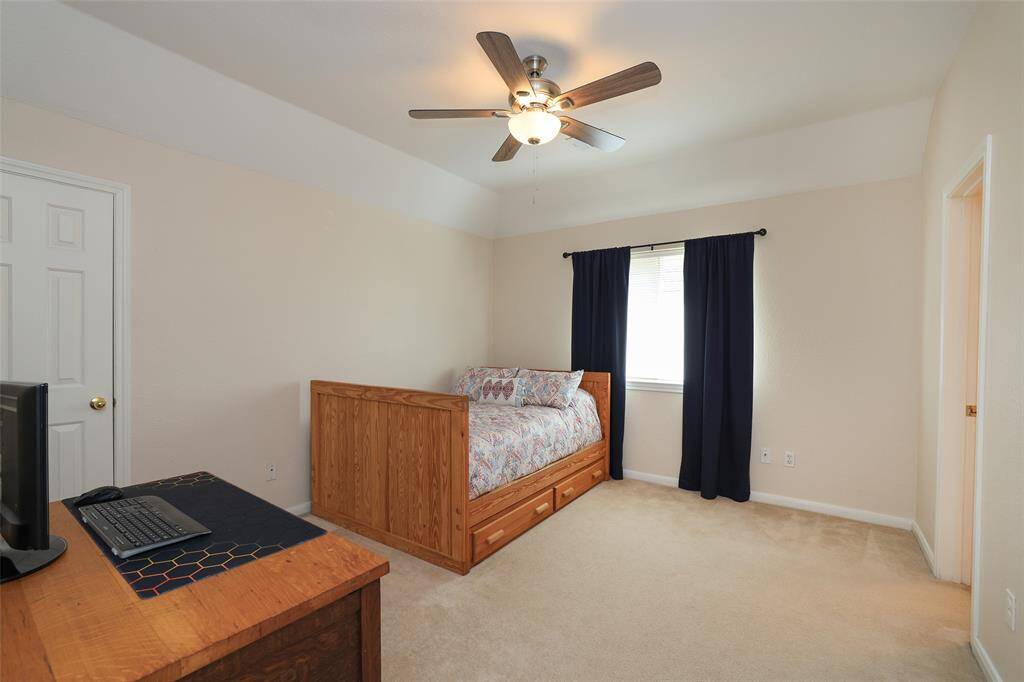 Secondary bedroom with full size doorway to floored attic space. Atis insulation 2024