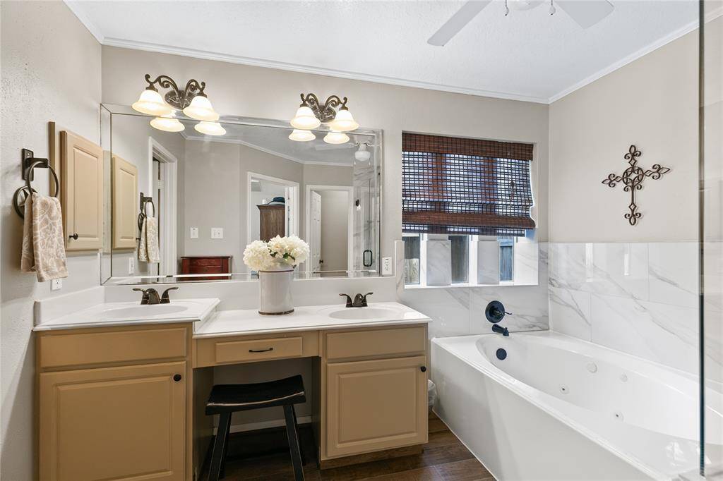 Primary bath with Jetted Tub and sperate shower, His and Her sinks with vanity area