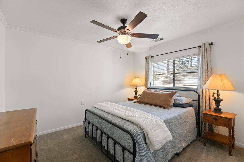 All bedrooms have ceiling fans this bedroom painted 2025