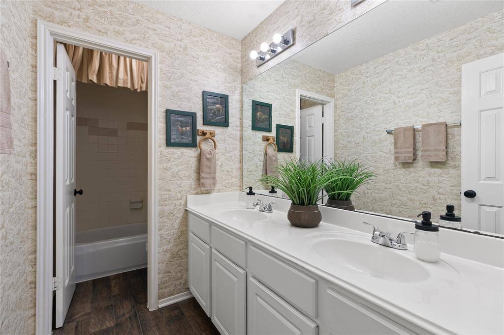 Upstairs bath has double sinks