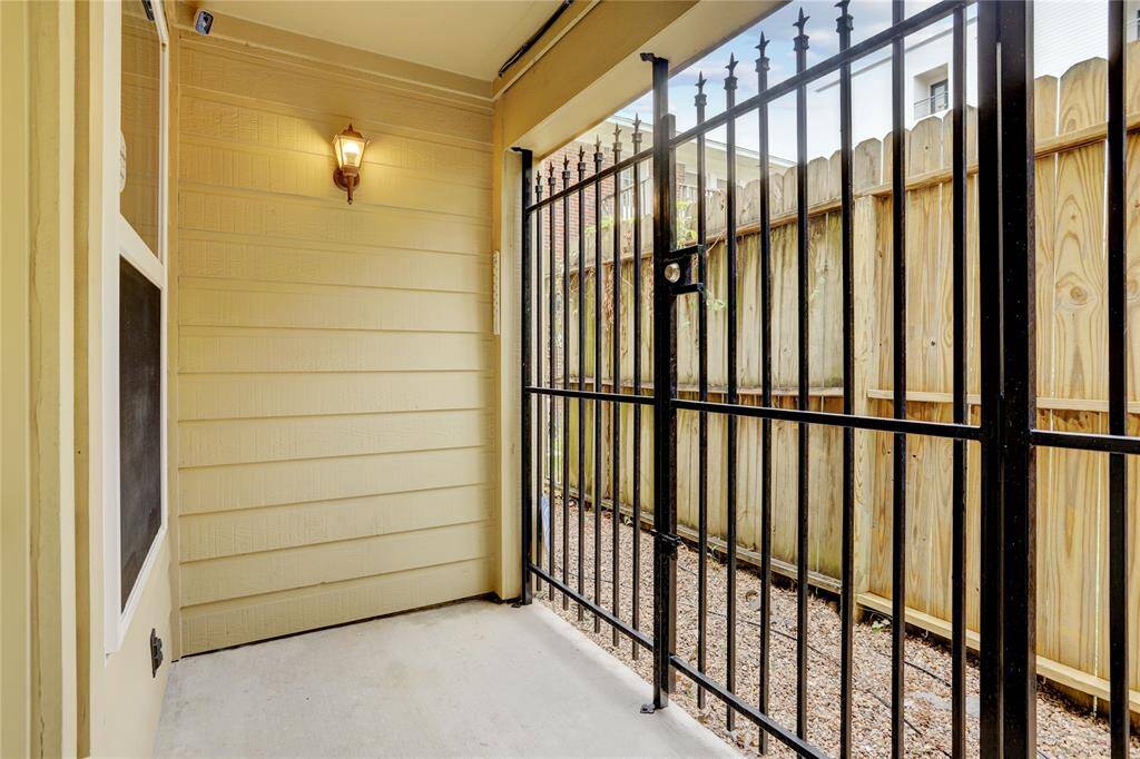A gated entrance provides both privacy and security while complementing the home’s sophisticated design and enhancing its overall appeal