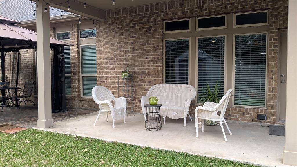 Relax on your extended back patio