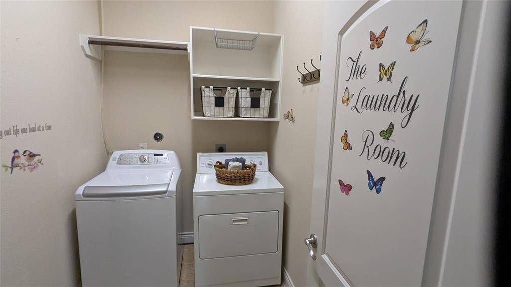 Laundry room has room for a second refrigerator or extra storage