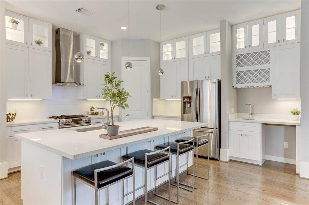 Head upstairs to your entertaining level. Here you'll find your living room, dining room, and gourmet kitchen.