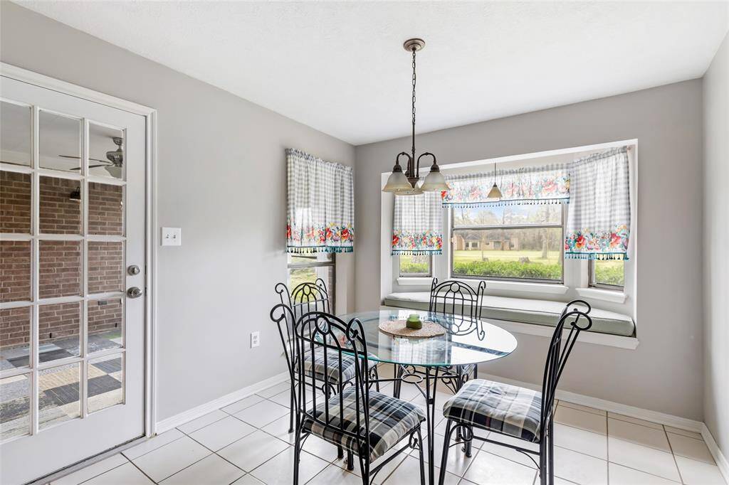 Breakfast area with bay window looking onto back yard